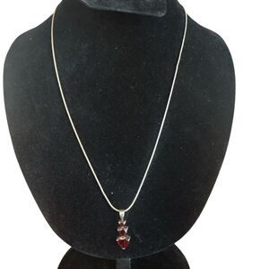 .925 Sterling Silver necklace with 3 tiered Garnet Heart pendant